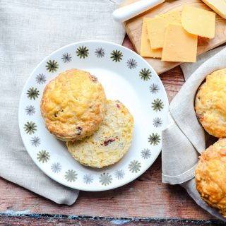 Bacon Cheddar Scones on napkin with cheese