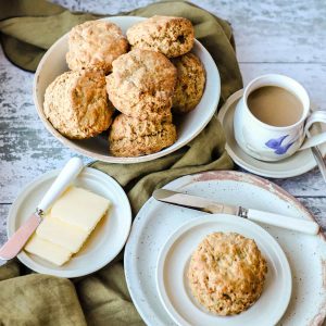 Treacle Scones (Scottish) in bowl one on plate butter and cup of coffee