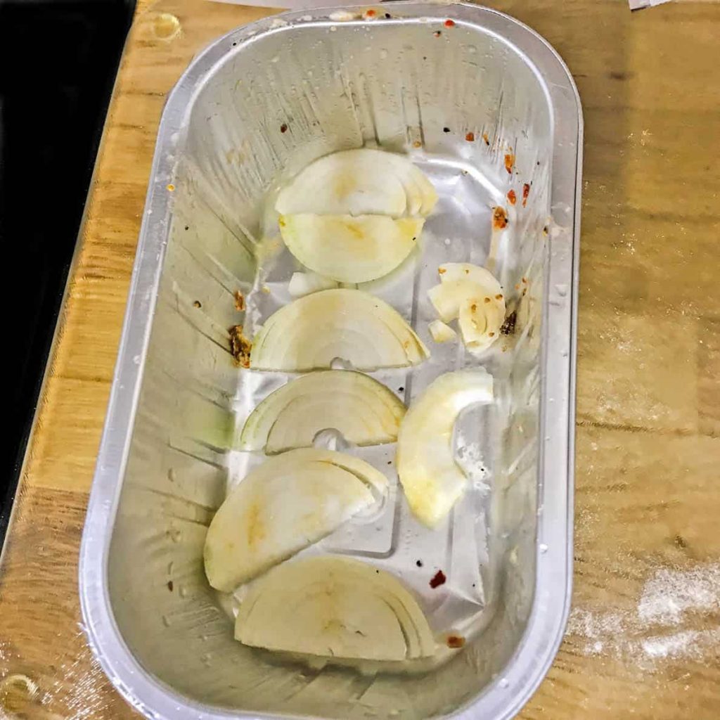 Roast chicken dinner - onions in base of foil tray