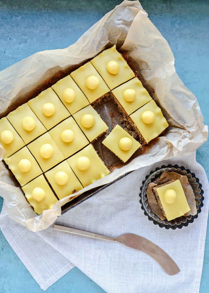 Simnel Traybake Cake in tray with knife