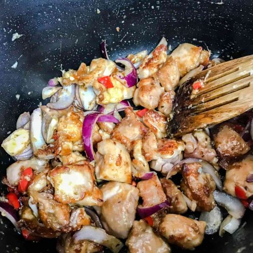 Add chicken to Kung Pao chicken slow cooker