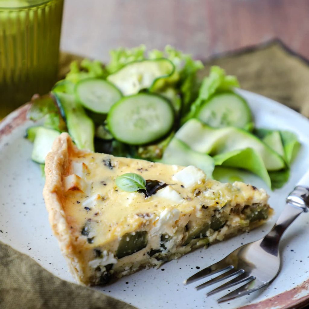 Courgette and Feta Tart with cucumber salad and glass