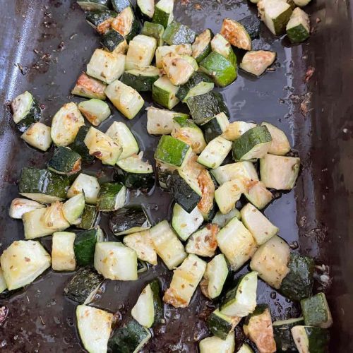 roasted courgettes in roasting tin
