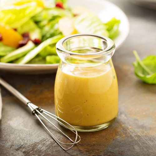 salad dressing in jar with whisk