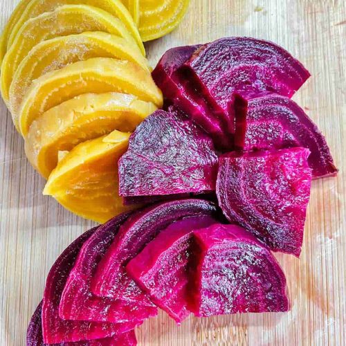 Slices of cooked purple and golden beetroot