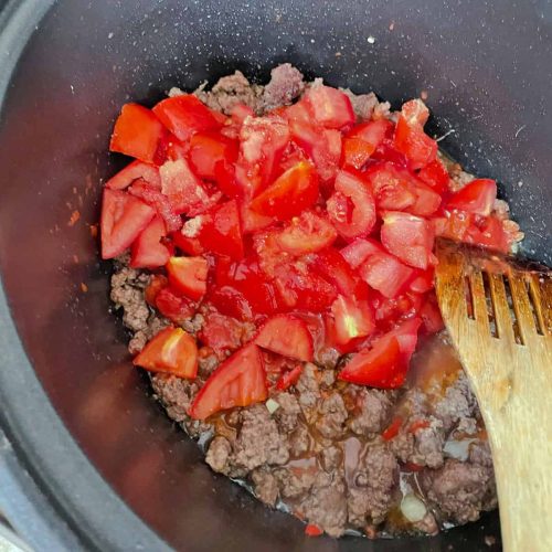 Add tomatoes to Slow cooker Chilli