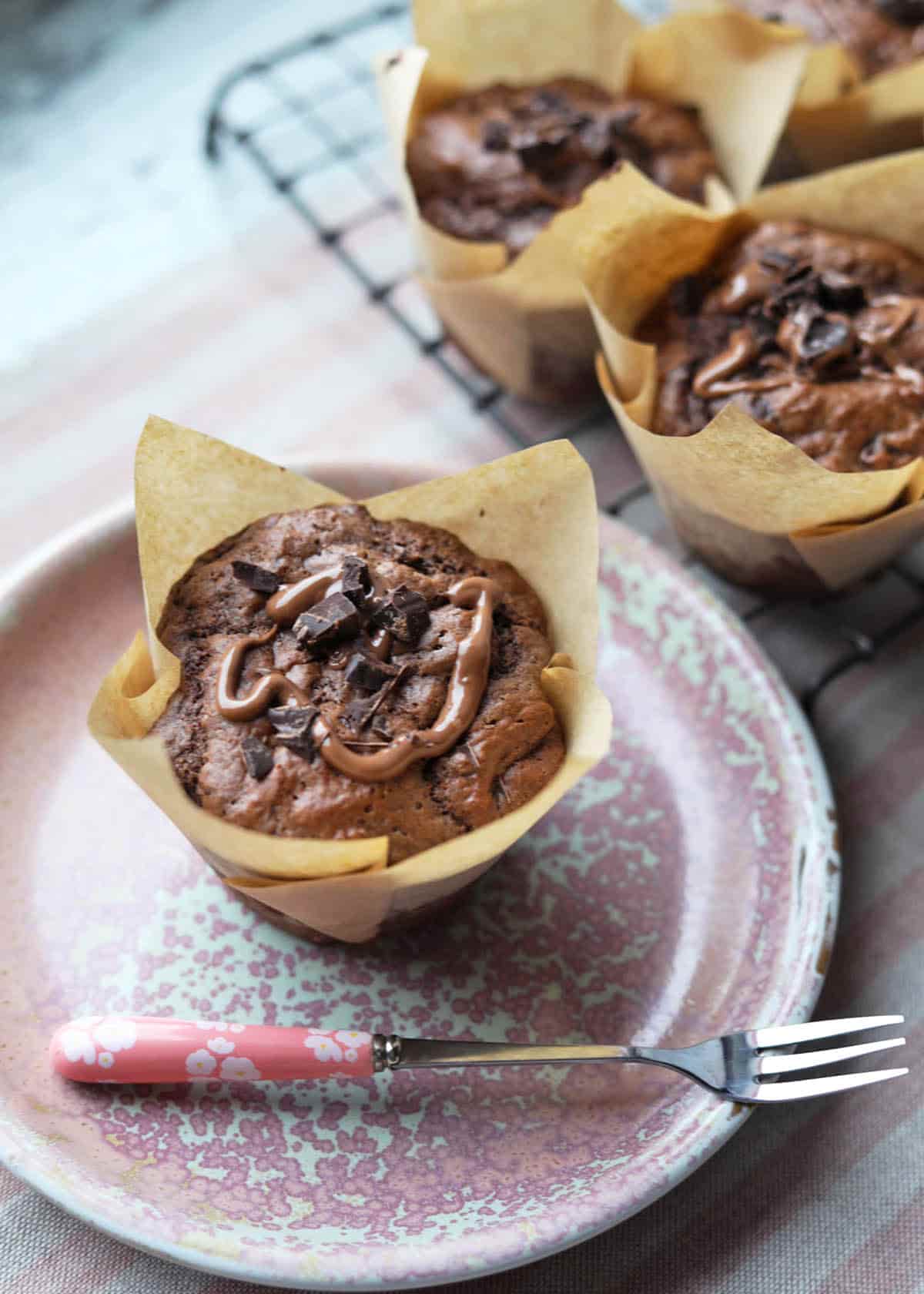 Double Chocolate Chip Muffins on plate with cake fork