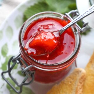 Peach & Strawberry Jam with spoonful of jam
