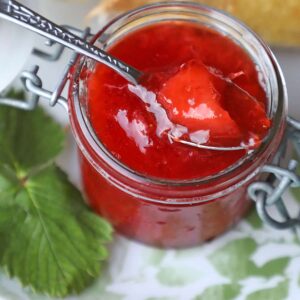 Peach & Strawberry Jam with spoon of jam
