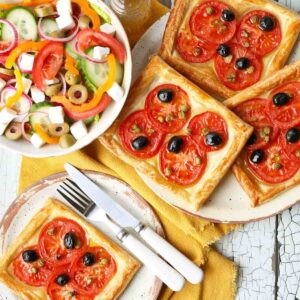 Tomato Tarts with salad and olives