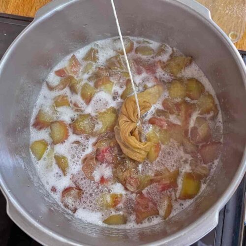 Rhubarb and Ginger jam boiling in pan
