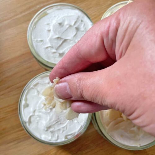 sprinkle almonds on individual raspberry trifles