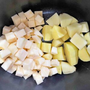 potatoes and swede in slow cooker with butter