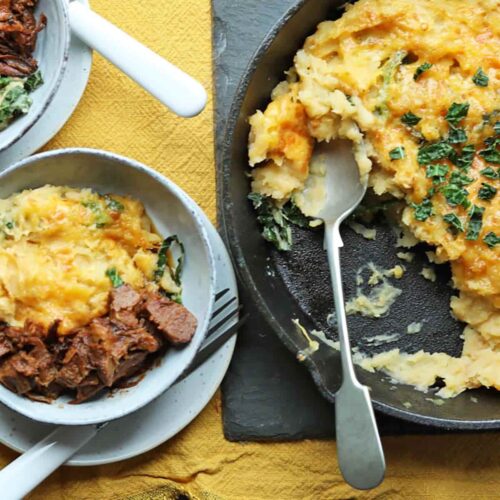 Slow Cooker Rumbledethumps plated and spoon