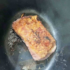Sear beef short ribs