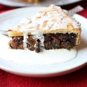 Slice of Airfryer Mincemeat Tart with cream