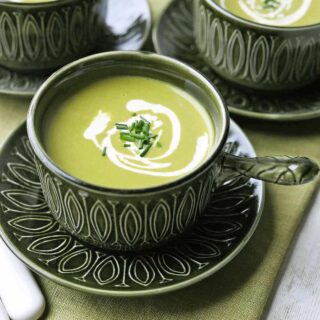 Bowl of lettuce soup with cream chives