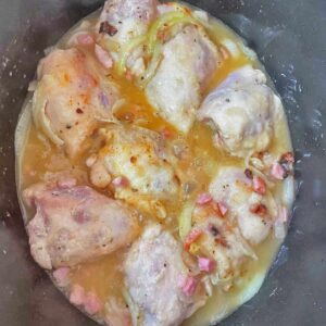 Slow Cooker Chicken Casserole in slow cooker with stock