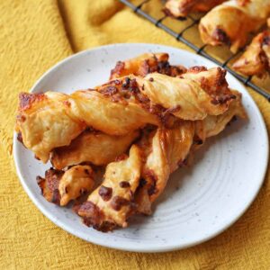 Air Fryer Cheese and Chorizo Puff Pastry Twists on plate