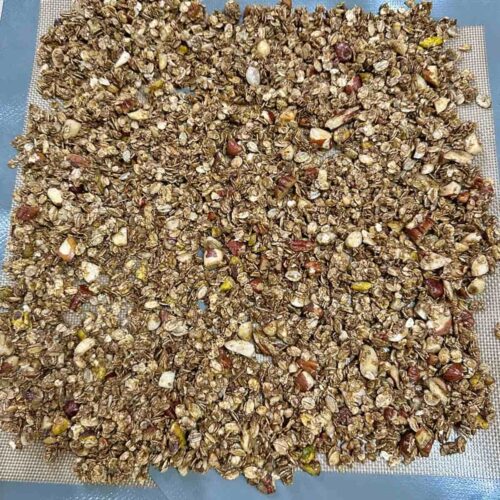 unbaked granola on baking tray