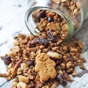 Gingerbread Granola spilling from jar