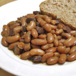Baked Haricot Beans with bread on plate