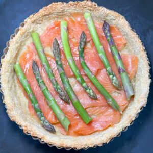 pastry case with smoked salmon and asparagus spears.