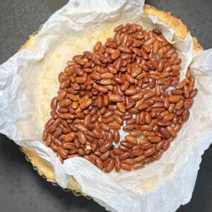 Baked pastry case with baking beans