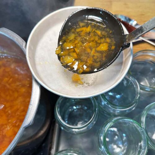 ladle marmalade into jars