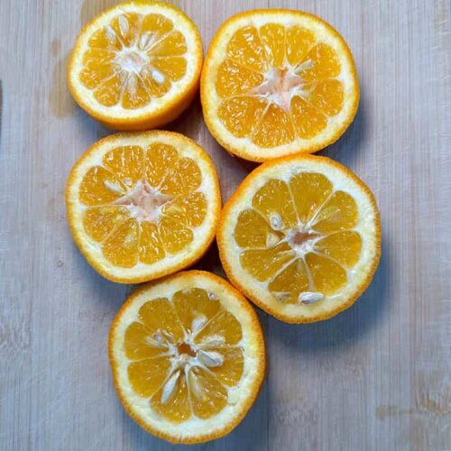 seville oranges cut in half.