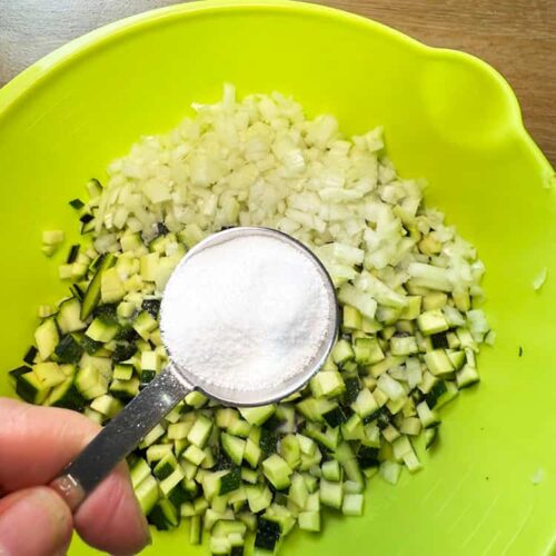 add salt to courgettes, onions, red pepper and apples.