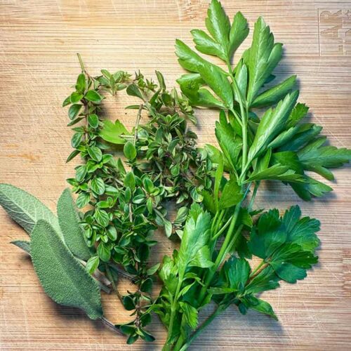 mixed fresh herbs on board.