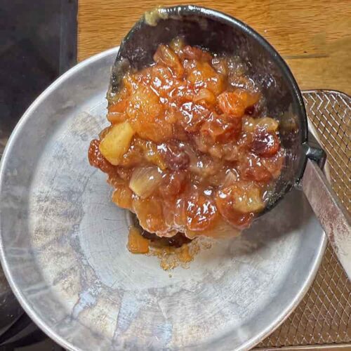 ladle of plum chutney.